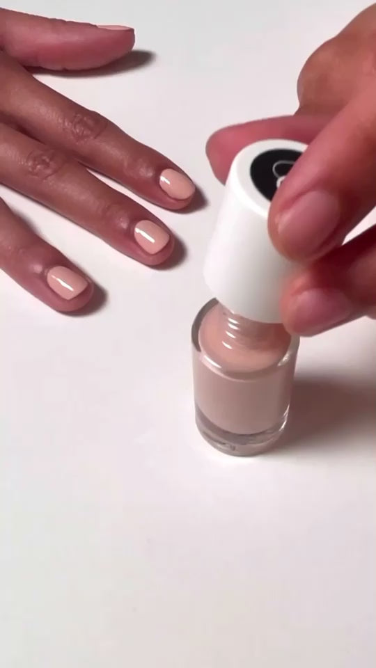 application of light pink beige nail polish color Sasha Pure Color