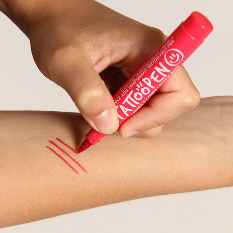 lines with red tattoo pen kids nailmatic kids